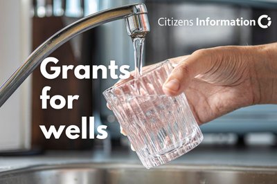 hand holding glass and tap water