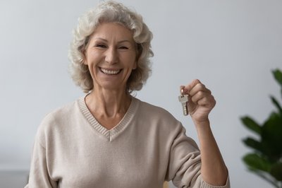 Woman with keys for renting