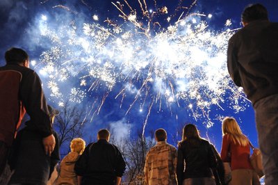 People watching fireworks in the sky