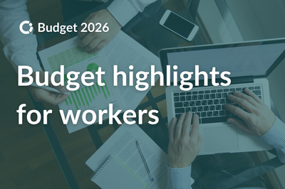 2 workers surrounded by documents, a mobile phone and a laptop. Text reads “Budget highlights for workers”.