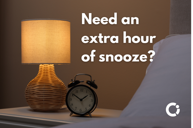 Bedside lamp and clock. Text reads "Need an extra hours of snooze ?".