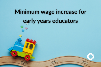 Child's toy train on toy tracks. Text reads: "Minimum wage increase for workers in early years’ education"