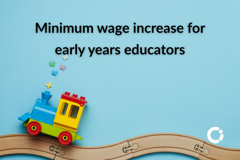 Child's toy train on toy tracks. Text reads: "Minimum wage increase for workers in early years’ education"