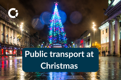 Christmas tree on a public street. Text reads "Public transport at Christmas".